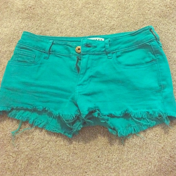 Teal frayed denim shorts