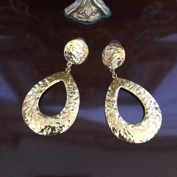 battered silver earrings