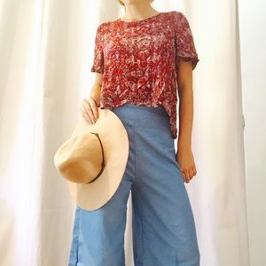 Hip patterned red top