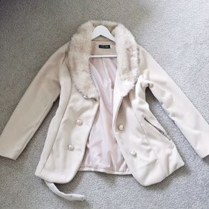 Cream trench coat with faux fur lining