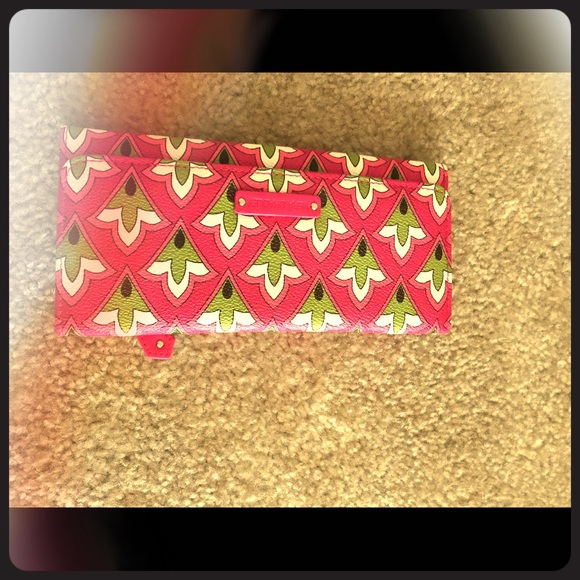 Vera Bradley trifold wallet leather material