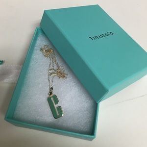 TIFFANY & CO. "C" GOLD PENDANT