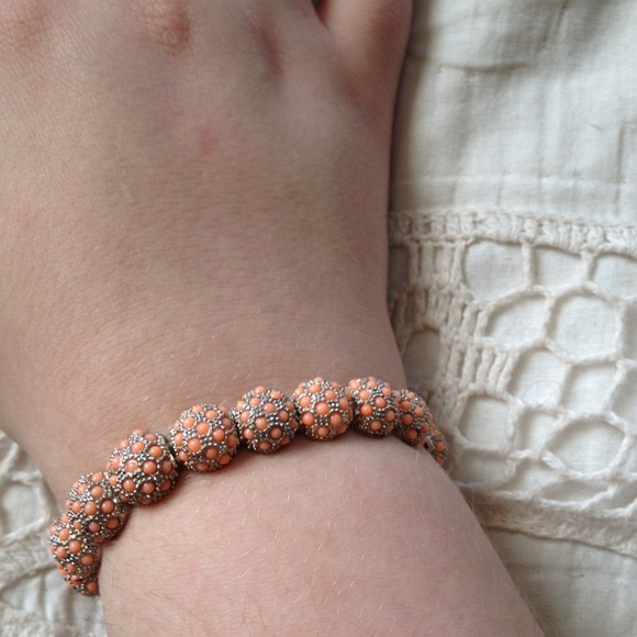 gold and pink elastic bracelet