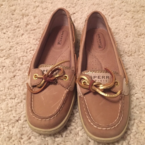 Sperry boat shoes. Has sparkles on the side
