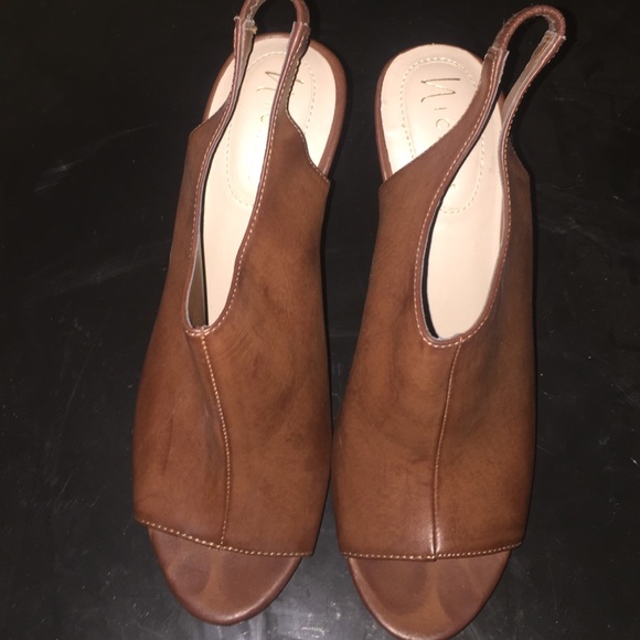 Tan sling back mules