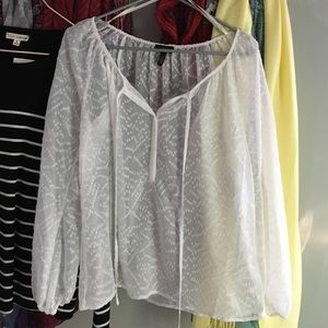 Sheer long sleeved top.