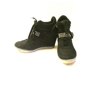 Wedged sneakers with studded strap