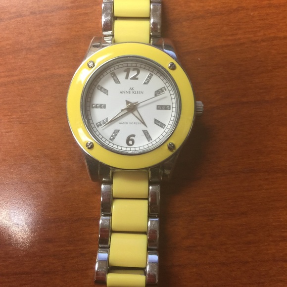 Yellow and silver watch
