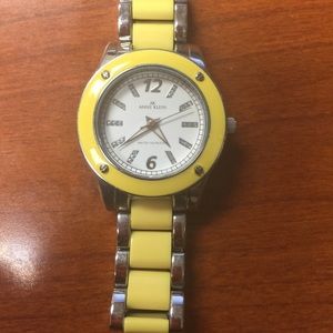 Yellow and silver watch