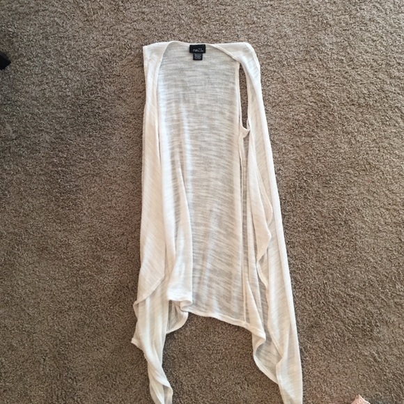 White sleeveless sweater