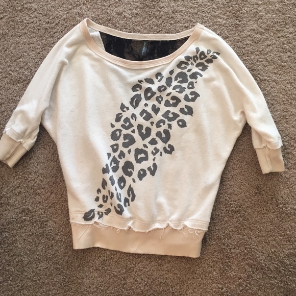 Off white top with cheetah design