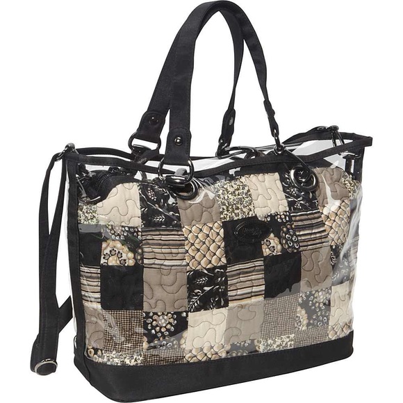 Brand new Donna Sharp purse with tags.