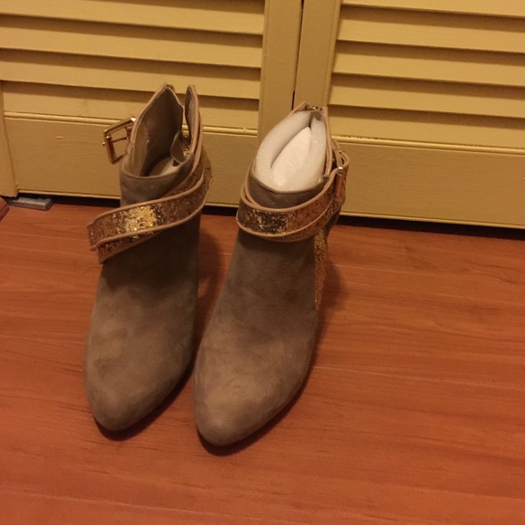 Brown and Gold boots the are beautiful .