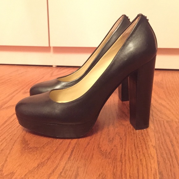 Coach black leather pumps