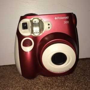 A Polaroid camera 300