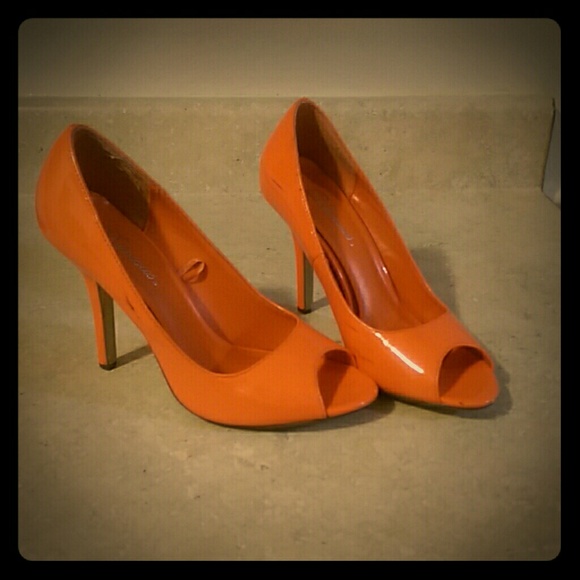 Neon orange high heels