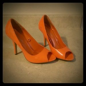 Neon orange high heels