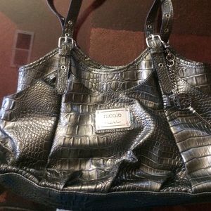 Metallic Silver purse by Nicole Miller.