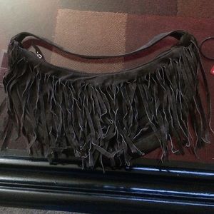 Brown purse with fringe by Wilson's Leather