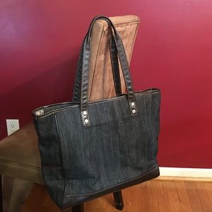 31 Blue Jean Colored Purse.