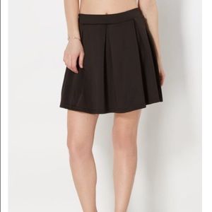 Black pleated skater skirt