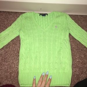 Green cable-knit sweater