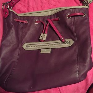 Purple and pink coach purse
