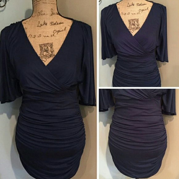 Beautiful Navy Ruched Bodycom Dress