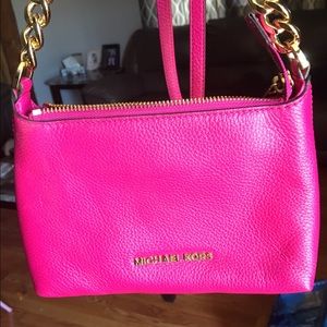 Authentic Michael Kors hot pink cross body