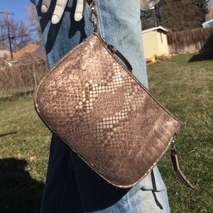 Leather metallic python wristlet. Banana Republic