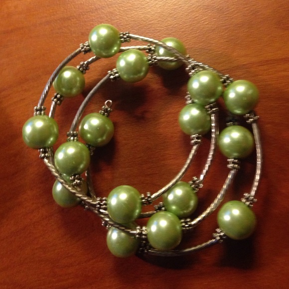 Silver and green wrap bracelet. Never worn.