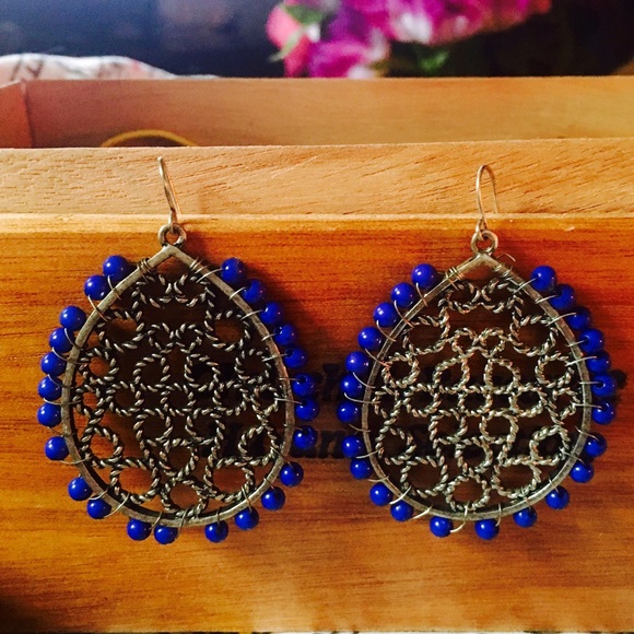 Large gold and blue earrings