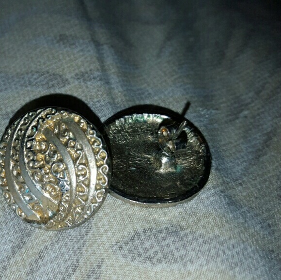 Gold circle earrings.
