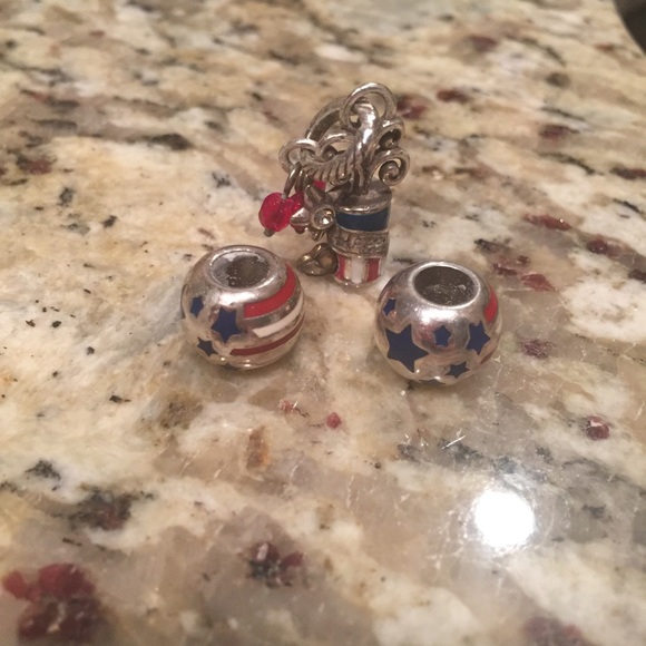 2 American flag beads and one firework charm