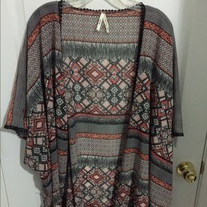 Kimono cardigan. Peach, black, white, and coral