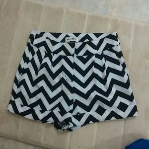 On hold. NWOT Black & white shorts.