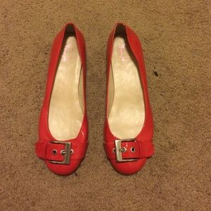 Orange buckle flats