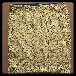 Never worn. Sequined gold skirt!
