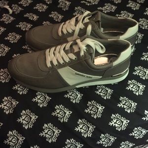 Micheal Kors 8.5 sneaks brand new never worn.