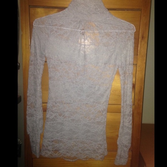 Gray lace turtleneck top.
