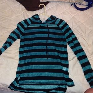 Blue and black striped long sleeve shirt.