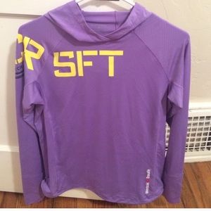 **holding** new reebok CrossFit motion hoodie