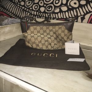 Gucci clutch or shoulder bag.