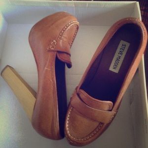 Brown heel clogs