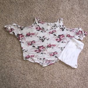 A floral crop top with open arms & white leggings
