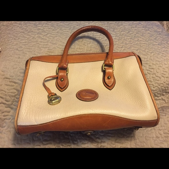 Dooney and Bourke cream vintage all weather