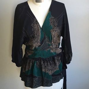 Anthro patterned wrap blouse