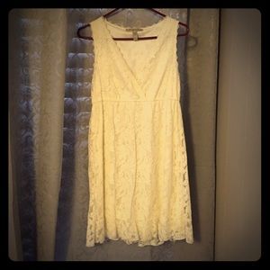 Sleeveless ivory lace, ruffle bottom dress!
