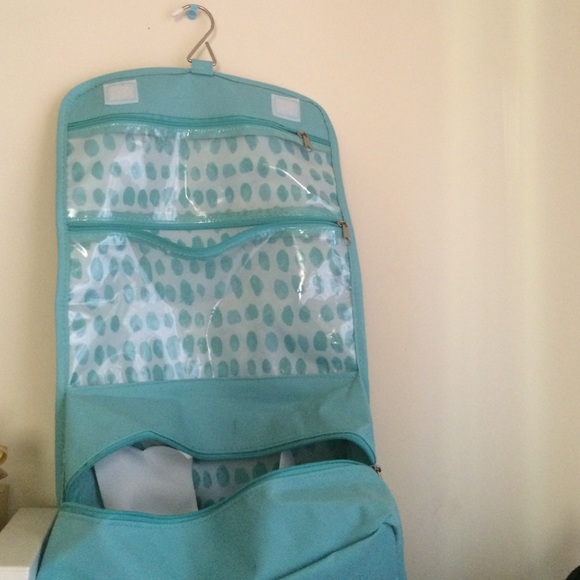 Roll up travel compartment