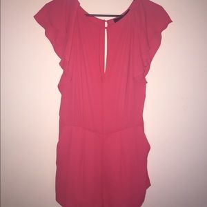 BCBG Maxazria Red Romper with an open back.
